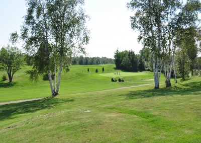 Golf carts on the green at Forest Ridge Golf & Country Club in Chelmsford, Greater Sudbury